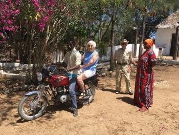 Emily ready to depart on her motorcycle taxi.